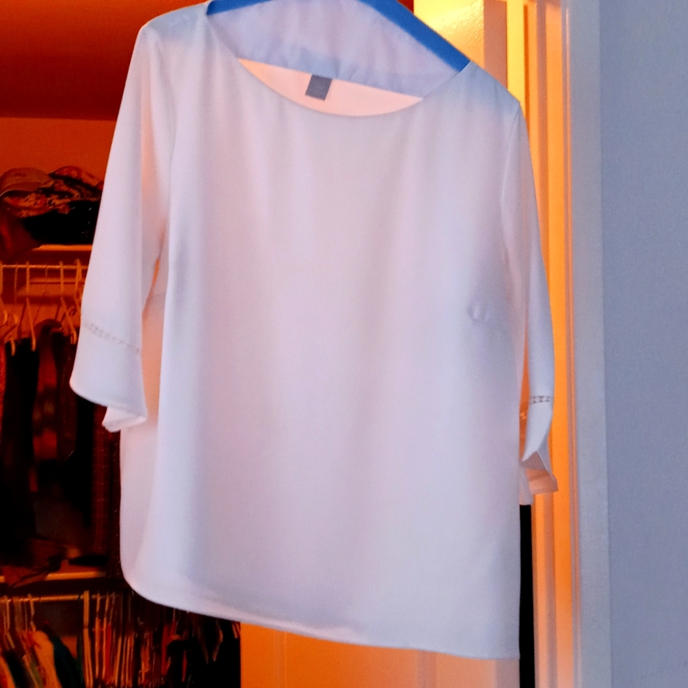 Like new white dress shirt. Arms are narrow.